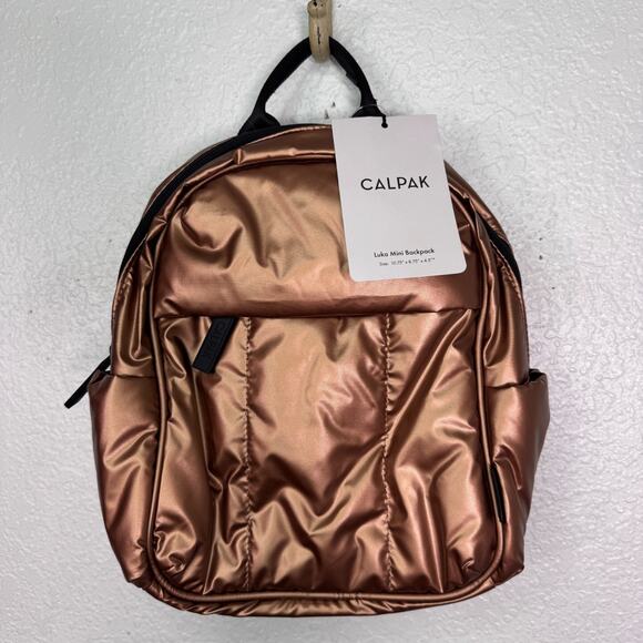 Calpak Handbags - Calpak Luka Mini Backpack Padded Travel Work School Bag Luggage Copper Color NEW